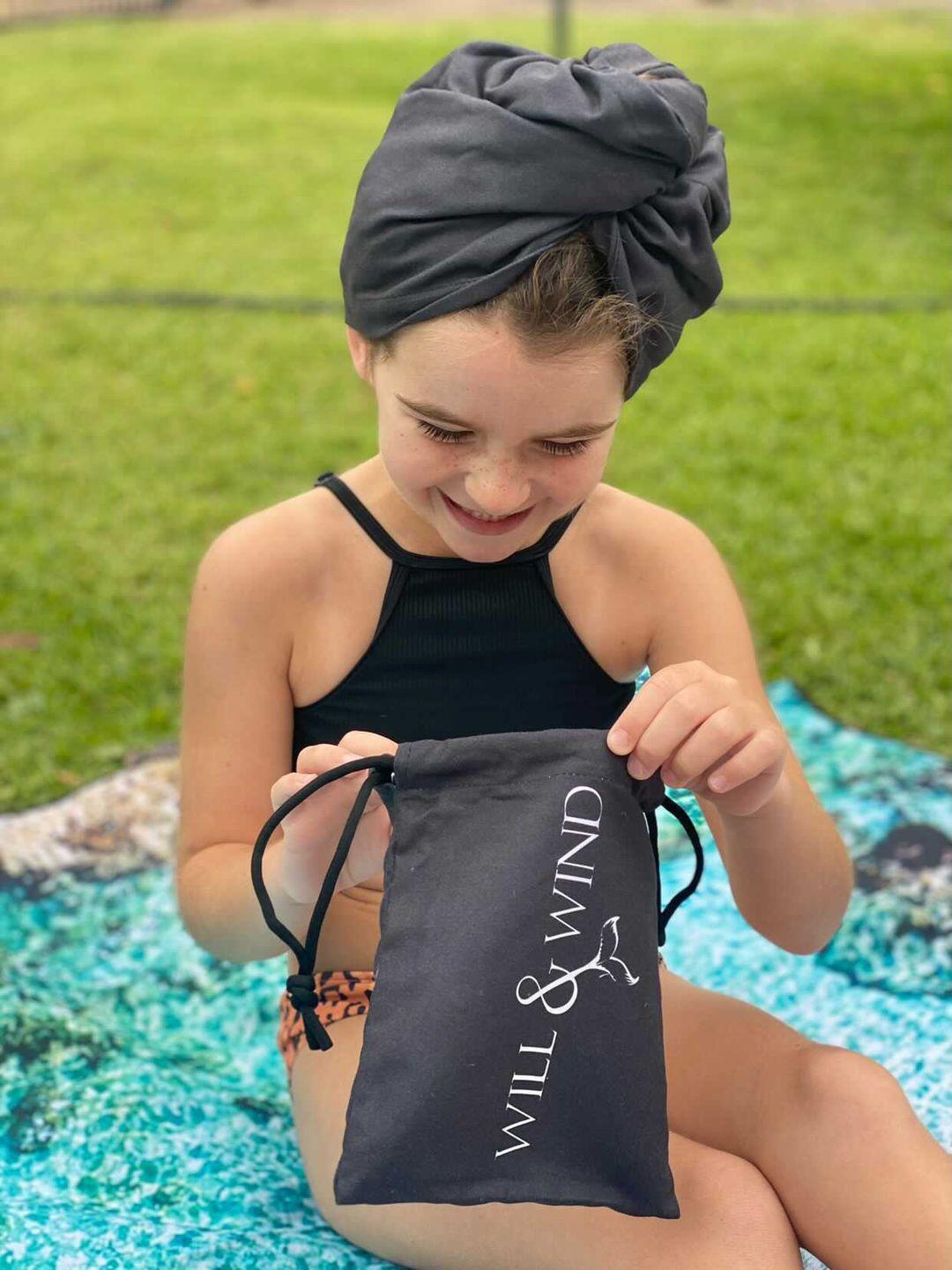 Quick Dry Hair WrapThe little sister to our Quick Dry Travel Towels ONE SIZE - Twist to fit Lightweight - Prevent neck pain from bulky towelsAbsorbent - holds 4x more water than a regular towelQuick Dry - dries within minutes, no soggy wet towels between useCompact - rolls to fit inside overnight travel bags, makeup bagsKeep wet hair off your shoulders - use post shower, bath, ocean swimsKeep hair out of face - use for skincare regime, make-up application, tanningKeep hair care products off your pillows and