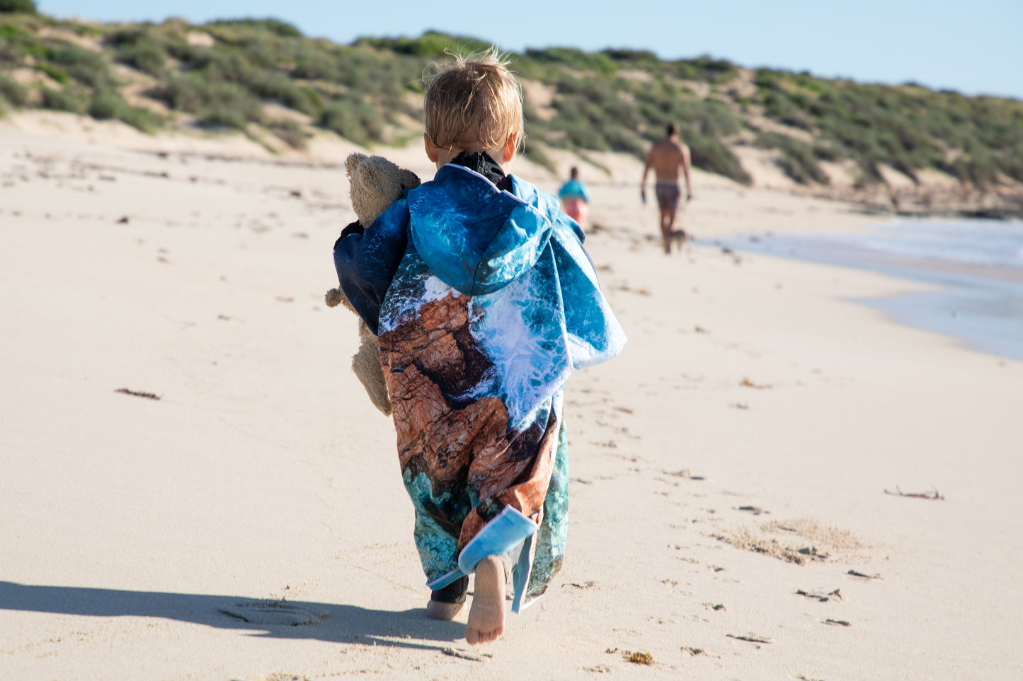 Mini Eyre HoodedExclusive design by Trip In A Van The Eyre; This stunning design was inspired by the powerful incoming waves crashing upon the crystal clear turquoise rockpools at Whalers Way on the Eyre Peninsula, South Australia. It’s the perfect mix of chaos and calm, powerful and still.All these elements give the towel a three-dimensional look, making you feel as though you are on the peninsula. Quick Dry Kids Hooded TowelFor the beach, travelling, camping, swimming lessons and more!Sustainably made usi