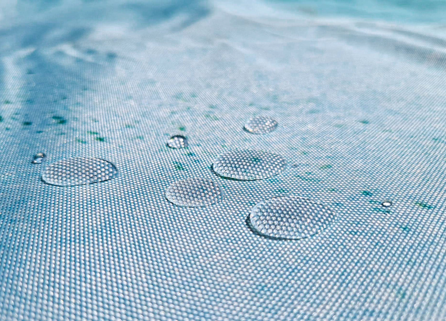 Kalbarri Beach MatDesign Inspired by Blue Holes in Kalbarri, WA "In the cold morning light, we float in the crystal clear rock pools of Kalbarri.We fly the drone and witness the contrast of colours and textures;blue water ripples, pastel pink windswept sand, earthy rock layers" FINALLY a mat you can throw down anywhere, anytime! The top side of our beach mats are made from an exceptionally durable, hard-wearing, yet soft feeling Oxford fabric. The rugged versatility of this material is perfect for outdoor c