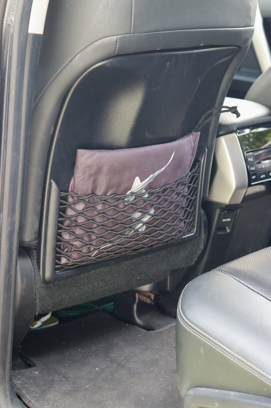 Yin Yang Leopard Sharks Car Seat Towel in bag in car seat pocket alternate view