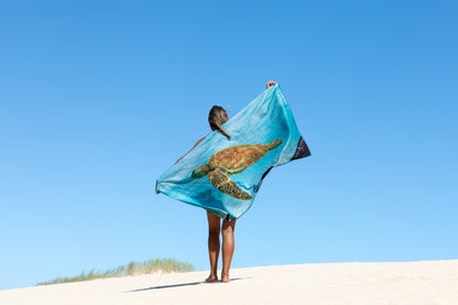 Green Sea Turtle Travel Towel.Inspired by the placid nature of the Ningaloo Green Sea Turtle.This guy gracefully swam out into the blue and followed us around for hours.Sand Free, Quick Dry Travel Towel For the beach, travelling, camping, exercising and more! Sustainably made using post-consumer plastic in the form of recycled Polyester (rPET)in our signature buttery soft Microfiber Suede$64.99Will and Wind